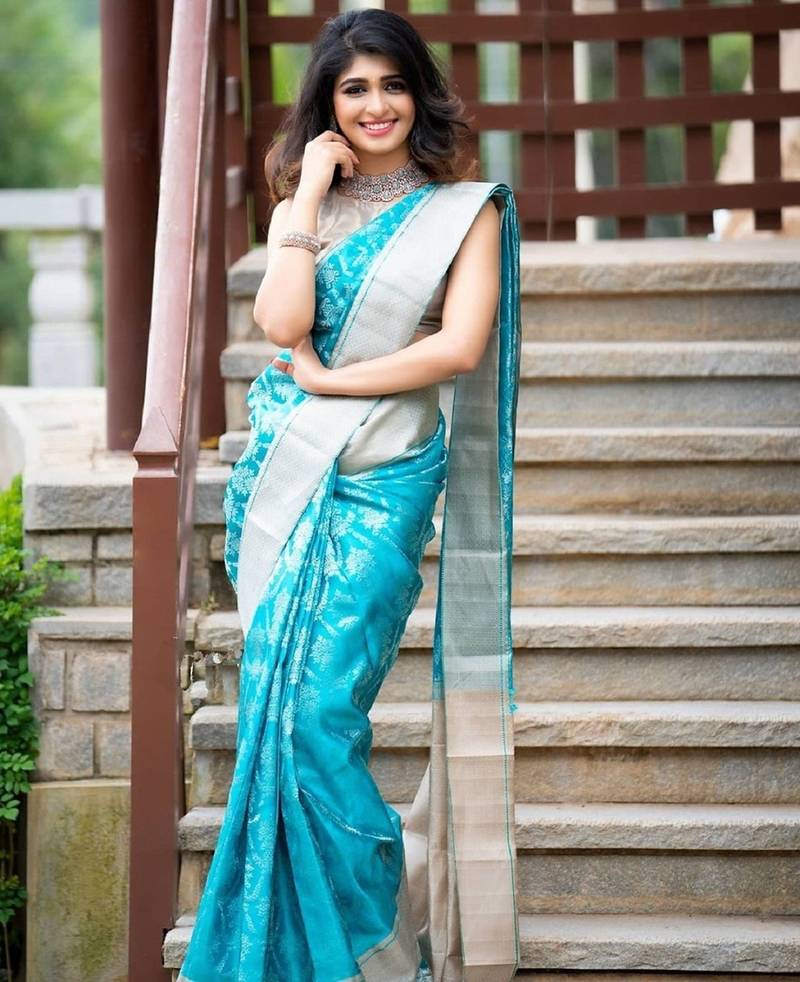 Turquoise silk blend jacuard work festival saree with unstitched blouse piece
