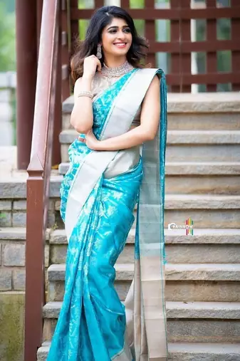 Turquoise silk blend jacuard work festival saree with unstitched blouse piece