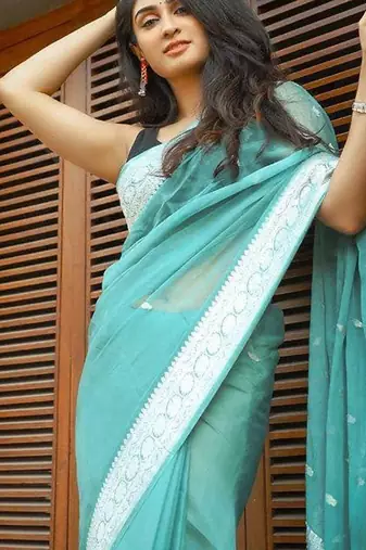 Rama  linen jacuard work festival saree with unstitched blouse piece