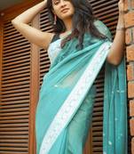 Rama  linen jacuard work festival saree with unstitched blouse piece