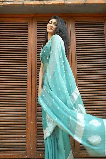 Rama  linen jacuard work festival saree with unstitched blouse piece