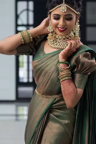 Green silk blend jacuard work festival saree with unstitched blouse piece
