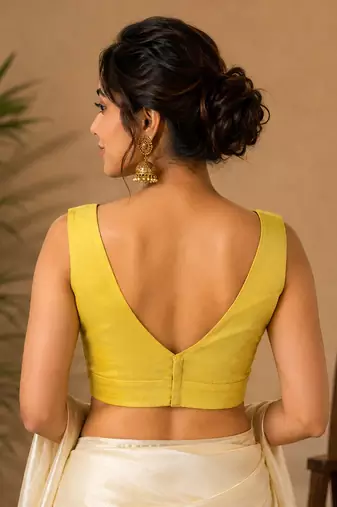 Yellow art silk stylish v-neck sleeveless plain stitched blouse for women