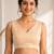Beige art silk stylish v-neck sleeveless plain stitched blouse for women