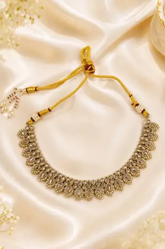Glimmery round and oval shape brown kundan stone mehandi gold plated choker set