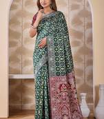 Bottle green banarasi kota cotton silk saree with woven zari work, floral traditional motifs, contrast pallu and blouse