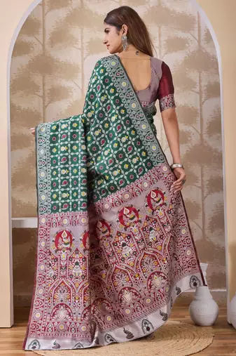 Bottle green banarasi kota cotton silk saree with woven zari work, floral traditional motifs, contrast pallu and blouse