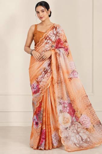 peach heavy silk blend printed saree with pape mirror work & mirror border