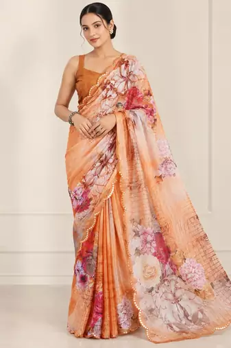 peach heavy silk blend printed saree with pape mirror work & mirror border