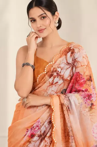 peach heavy silk blend printed saree with pape mirror work & mirror border