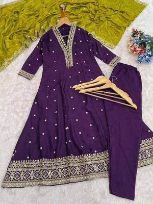 Women wine purple embroidered v-neck a-line kurta pant set with contrast green dupatta 4