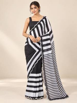 black heavy silk blend printed saree with pape mirror work & mirror border 1