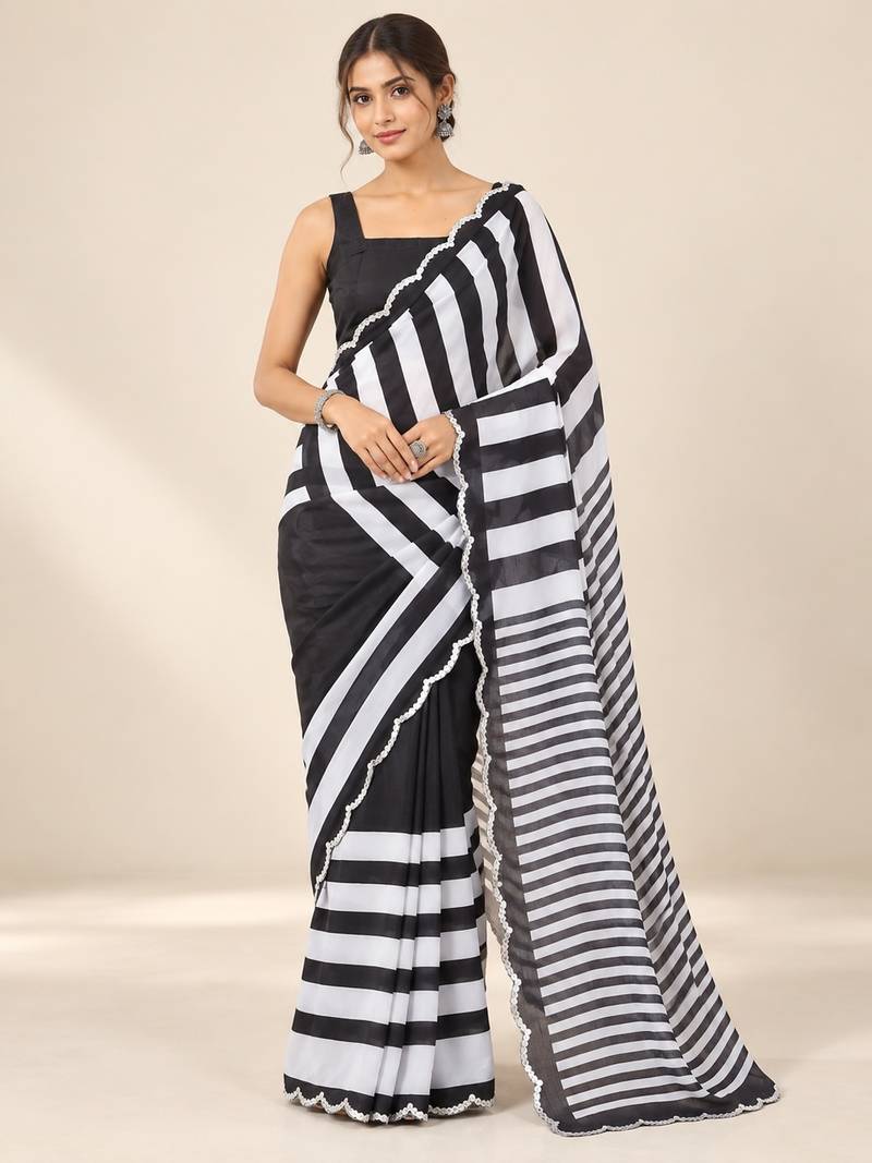 black heavy silk blend printed saree with pape mirror work & mirror border