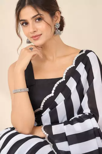black heavy silk blend printed saree with pape mirror work & mirror border