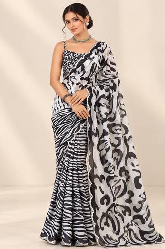 black heavy silk blend printed saree with pape mirror work & mirror border