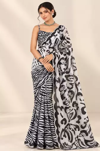 black heavy silk blend printed saree with pape mirror work & mirror border