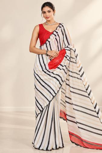 off white heavy silk blend printed saree with pape mirror work & mirror border