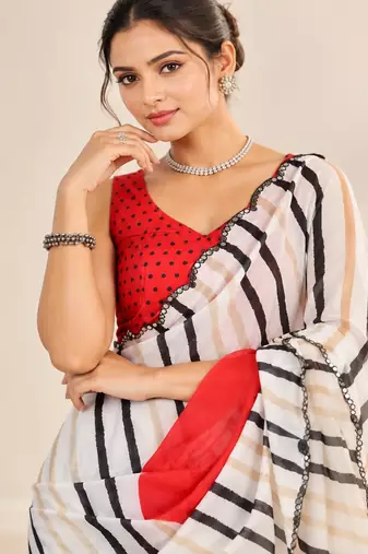 off white heavy silk blend printed saree with pape mirror work & mirror border