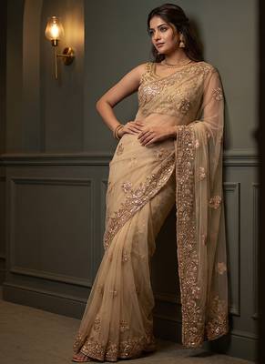 Beige embroidered net saree 2