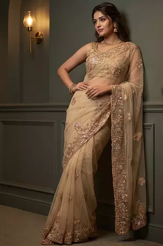 Beige embroidered net saree