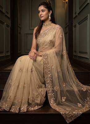 Beige embroidered net saree 3