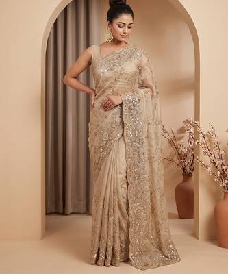 Champagne gold embroidered galaxy soft net saree 1