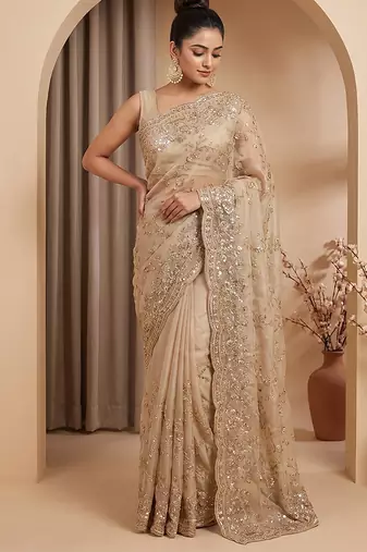 Champagne gold embroidered galaxy soft net saree