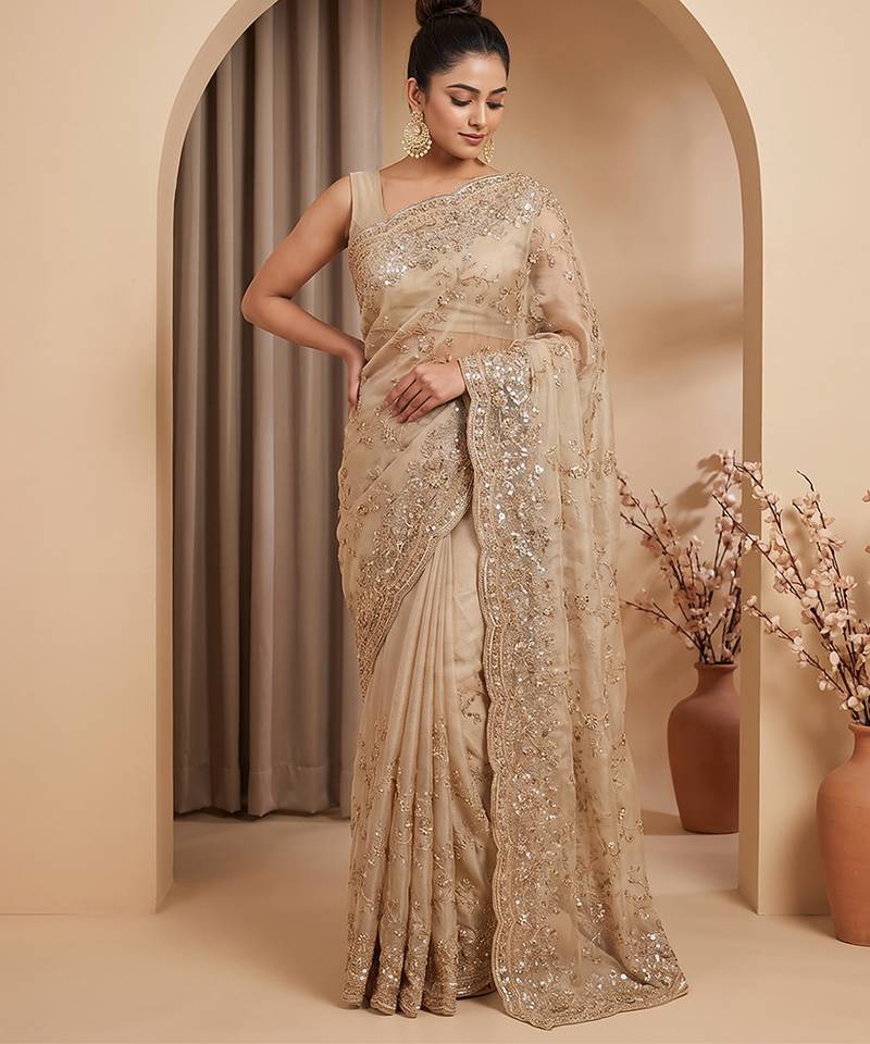 Champagne gold embroidered galaxy soft net saree