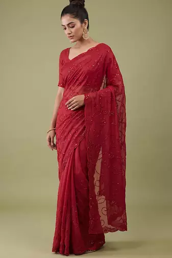 Red embroidered galaxy soft net saree