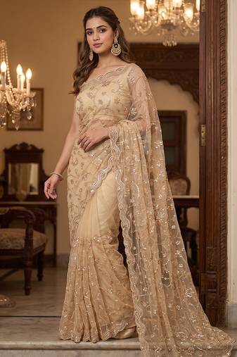 Beige embroidered net saree