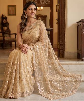 Beige embroidered net saree 3