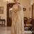 Beige embroidered net saree