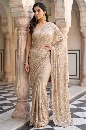 Beige embroidered net saree