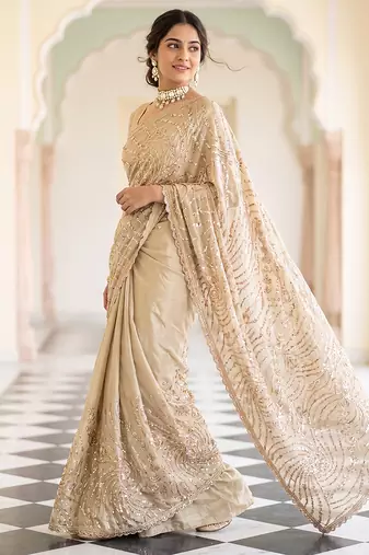 Beige embroidered net saree