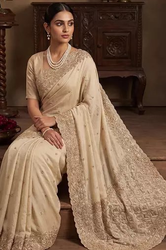 Cream embroidered soft foil georgette saree