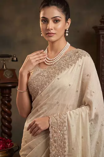 Cream embroidered soft foil georgette saree