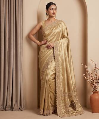 Champagne gold embroidered viscose saree 1