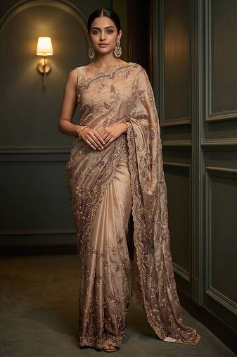 Beige embroidered georgette saree