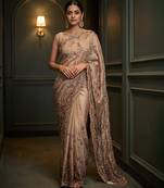 Beige embroidered georgette saree