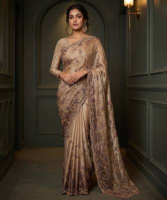 Beige embroidered georgette saree 2