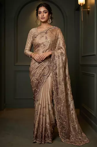 Beige embroidered georgette saree