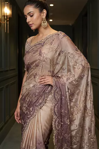 Beige embroidered georgette saree