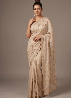 Cream embroidered georgette saree 1