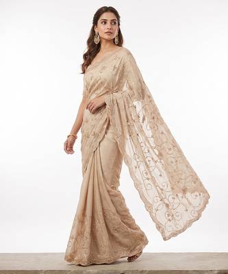 Cream embroidered georgette saree 2