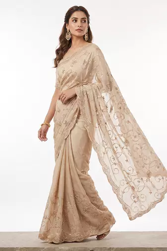 Cream embroidered georgette saree