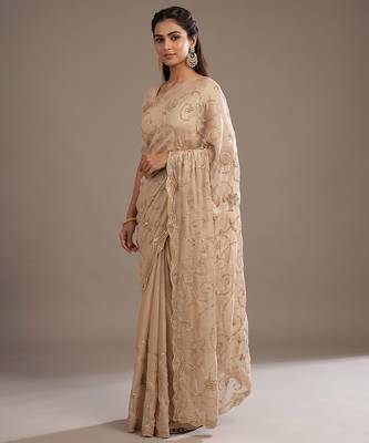 Cream embroidered georgette saree 3