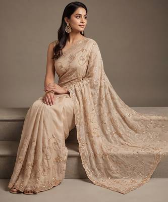 Cream embroidered georgette saree 4