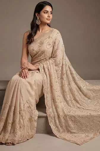 Cream embroidered georgette saree