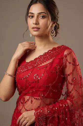 Red embroidered net saree