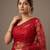 Red embroidered net saree